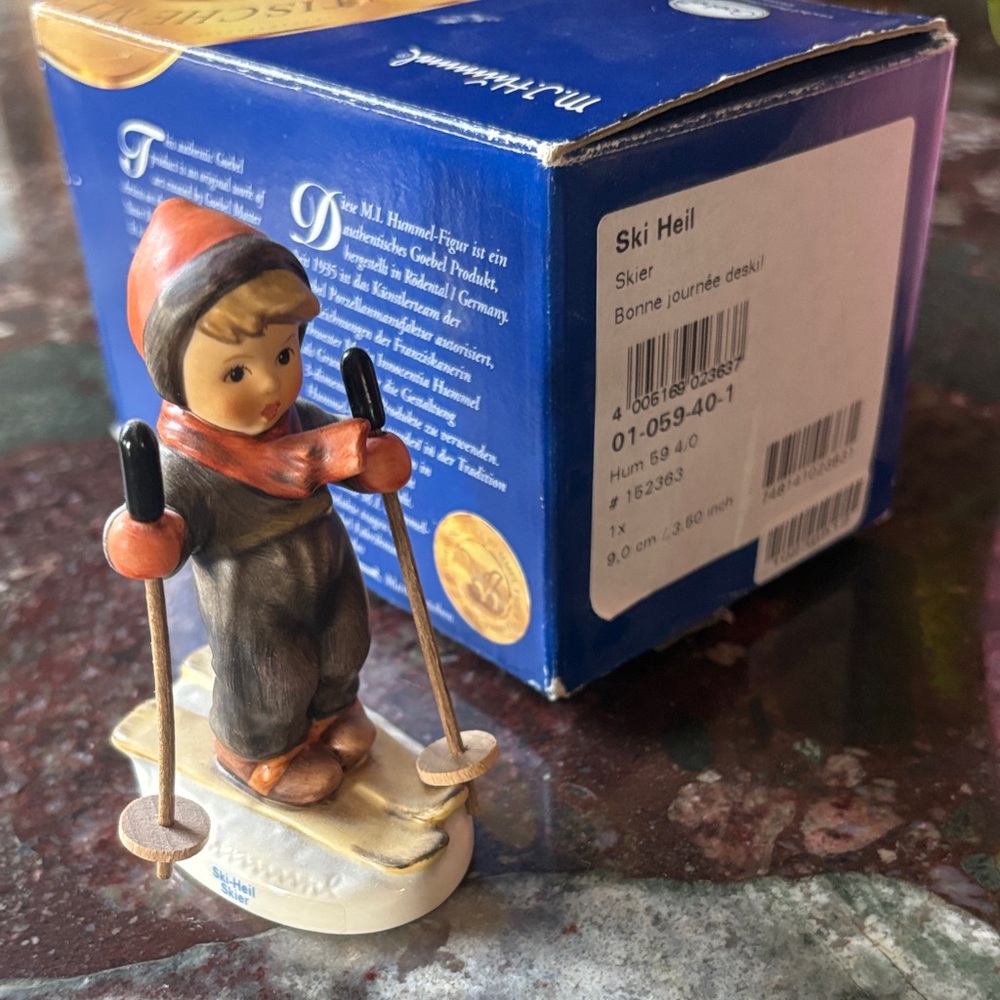 Hummel Skiing Child Figurine with original box. New! Never displayed.